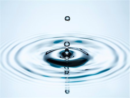 droplet - Close up of splashing water droplet Stock Photo - Premium Royalty-Free, Code: 6113-06721340