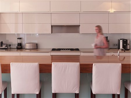 Modern kitchen with barstools Stock Photo - Premium Royalty-Free, Code: 6113-06898688