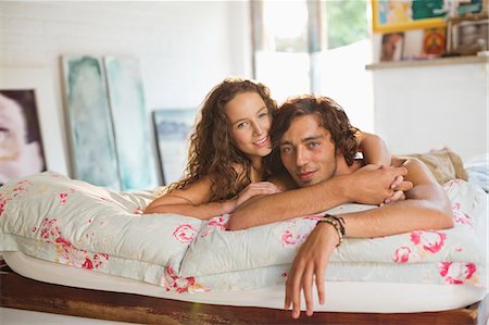 romantic couple bed - Couple relaxing together on bed Stock Photo - Premium Royalty-Free, Code: 6113-06908530