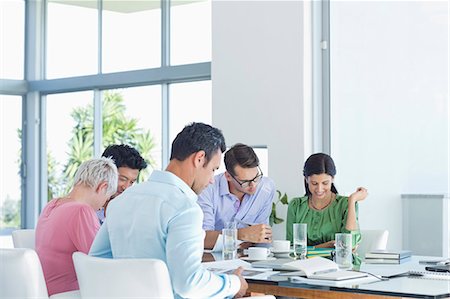 Business people working in meeting Stock Photo - Premium Royalty-Free, Code: 6113-06908964