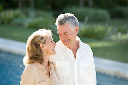 senior couples lifestyle - Senior couple at poolside Stock Photo - Premium Royalty-Free, Code: 6113-07146955