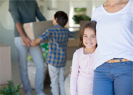 Family moving into new house Stock Photo - Premium Royalty-Free, Code: 6113-07147238