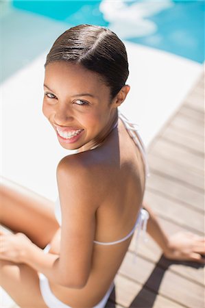 simsearch:6113-07147417,k - Portrait of smiling woman at poolside Stock Photo - Premium Royalty-Free, Code: 6113-07147463