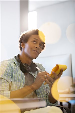 student (male) - Businessman taking notes in office Stock Photo - Premium Royalty-Free, Code: 6113-07147892