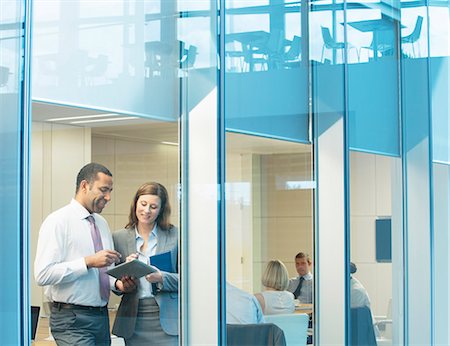 people working - Business people talking in conference room Stock Photo - Premium Royalty-Free, Code: 6113-07158975