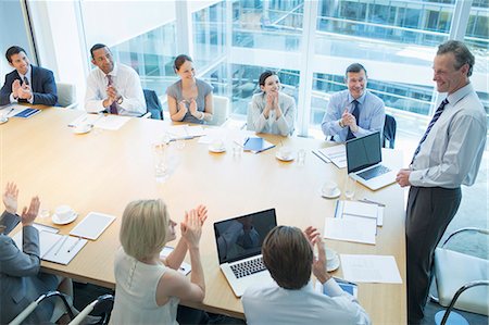 simsearch:695-05771662,k - Business people clapping in meeting Stock Photo - Premium Royalty-Free, Code: 6113-07159042