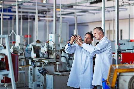 scrutiny - Scientists working in laboratory Stock Photo - Premium Royalty-Free, Code: 6113-07159059