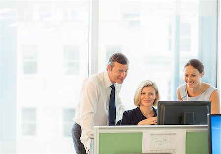 simsearch:6113-07159049,k - Business people working in office Stock Photo - Premium Royalty-Free, Code: 6113-07159017