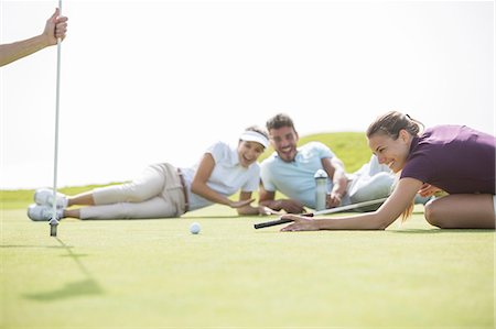 simsearch:6113-07159316,k - Friends laying on golf course Stock Photo - Premium Royalty-Free, Code: 6113-07159227