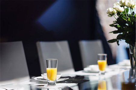 Mimosas on elegant dining table Stock Photo - Premium Royalty-Free, Code: 6113-07159445