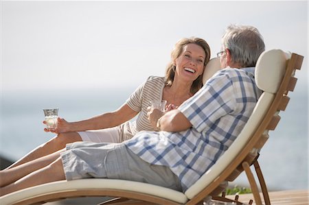 simsearch:6113-07159513,k - Older couple relaxing in lawn chairs Stock Photo - Premium Royalty-Free, Code: 6113-07159598