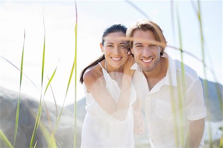 simsearch:649-06433219,k - Couple smiling together outdoors Stock Photo - Premium Royalty-Free, Code: 6113-07159622