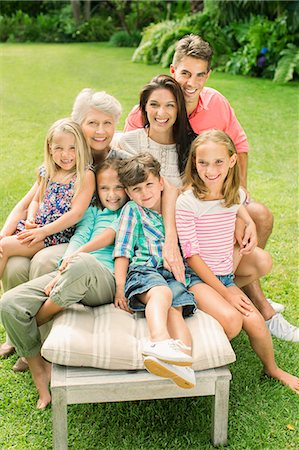 simsearch:6113-07159699,k - Family sitting together in backyard Stock Photo - Premium Royalty-Free, Code: 6113-07159714