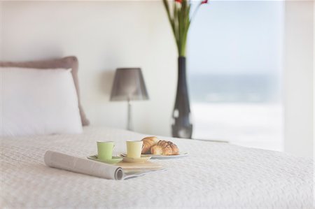 Breakfast on bed in modern bedroom Stock Photo - Premium Royalty-Free, Code: 6113-07160155