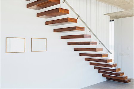 Floating stairs in modern house Stock Photo - Premium Royalty-Free, Code: 6113-07160211