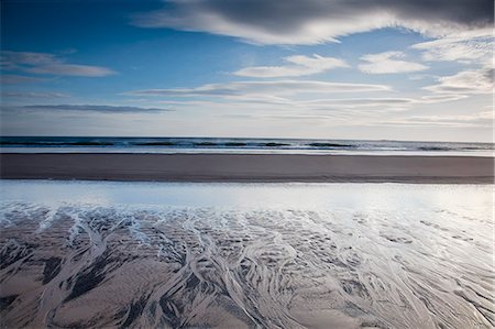 Beach at low tide Fotografie stock - Premium Royalty-Free, Codice: 6113-07160363