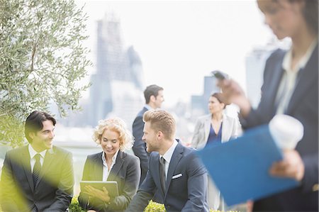 simsearch:6113-07160507,k - Business people talking outdoors Stock Photo - Premium Royalty-Free, Code: 6113-07160442