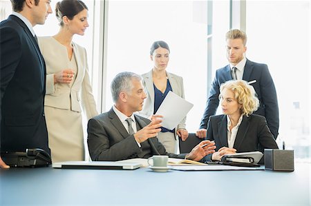 simsearch:6113-07159049,k - Business people talking in meeting Stock Photo - Premium Royalty-Free, Code: 6113-07160424