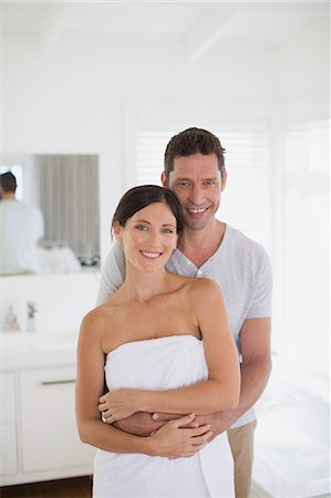 romanticism - Couple hugging in bathroom Stock Photo - Premium Royalty-Free, Code: 6113-07242671