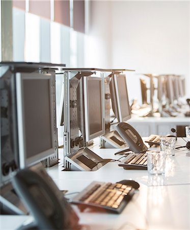 electronics computer technology - Computers and telephones at desk in office Stock Photo - Premium Royalty-Free, Code: 6113-07243094