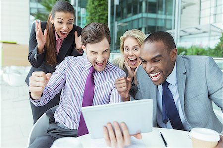 simsearch:6113-07243187,k - Business people cheering outdoors Stock Photo - Premium Royalty-Free, Code: 6113-07243096