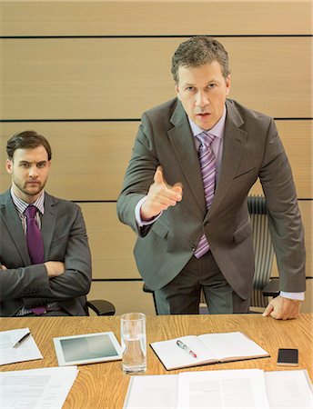 simsearch:6113-07243220,k - Businessman shaking his finger in meeting Stock Photo - Premium Royalty-Free, Code: 6113-07243184