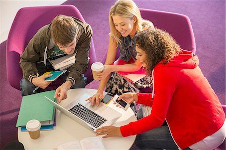 study table - University students using laptop in lounge Stock Photo - Premium Royalty-Free, Code: 6113-07243380