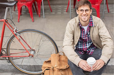 student back pack - Man drinking coffee on city street Stock Photo - Premium Royalty-Free, Code: 6113-07542473