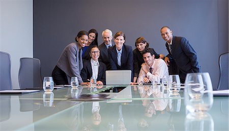 simsearch:649-02667002,k - Business people using laptop in meeting Stock Photo - Premium Royalty-Free, Code: 6113-07542618