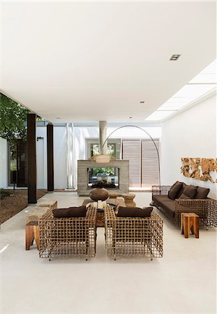 Armchairs and fireplace in modern living room Stockbilder - Premium RF Lizenzfrei, Bildnummer: 6113-07542715