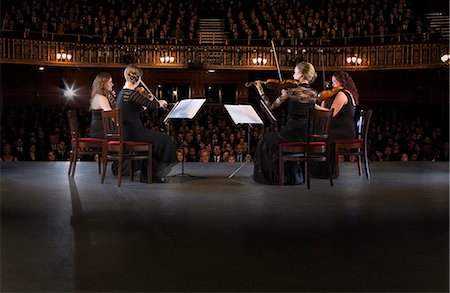 simsearch:6113-07542938,k - Quartet performing on stage in theater Photographie de stock - Premium Libres de Droits, Code: 6113-07542920