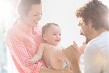 play family - Parents playing with baby boy Stock Photo - Premium Royalty-Free, Code: 6113-07543142
