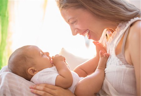 Mother holding baby boy Stock Photo - Premium Royalty-Free, Code: 6113-07543182