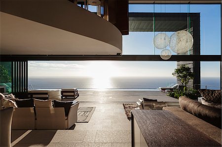 simsearch:6113-07159869,k - Modern house overlooking ocean Stock Photo - Premium Royalty-Free, Code: 6113-07543343