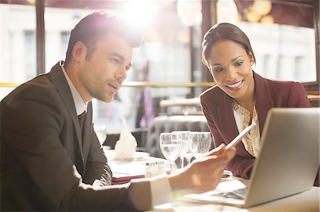 people at lunch - Business people working in restaurant Stock Photo - Premium Royalty-Free, Code: 6113-07543397