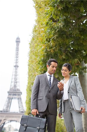 simsearch:6108-05873097,k - Business people talking near Eiffel Tower, Paris, France Stock Photo - Premium Royalty-Free, Code: 6113-07543443
