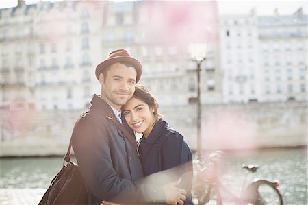 simsearch:6113-07543549,k - Couple hugging along Seine River, Paris, France Stock Photo - Premium Royalty-Free, Code: 6113-07543555