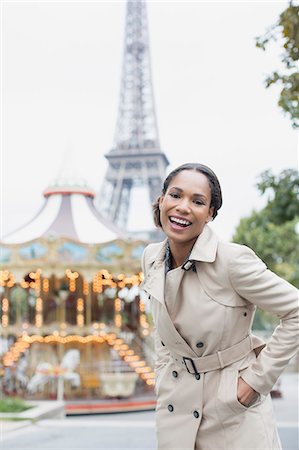 roundabout - Woman standing near carousel and Eiffel Tower, Paris, France Stock Photo - Premium Royalty-Free, Code: 6113-07543598