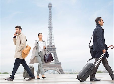 eiffel tower - Business people walking near Eiffel Tower, Paris, France Stock Photo - Premium Royalty-Free, Code: 6113-07543508