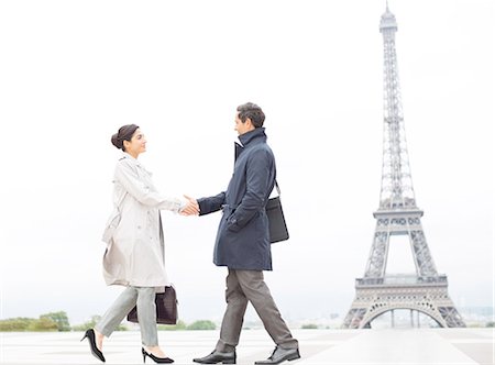 success smile outdoors - Business people shaking hands near Eiffel Tower, Paris, France Stock Photo - Premium Royalty-Free, Code: 6113-07543519