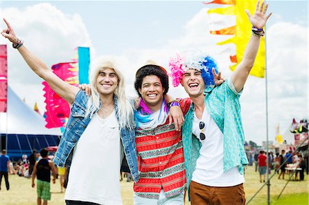 funny people happy caucasian - Portrait of cheering friends in wigs at music festival Stock Photo - Premium Royalty-Free, Code: 6113-07564872