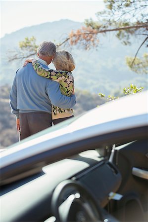 simsearch:6122-07699789,k - Senior couple looking at mountain view outside car Stock Photo - Premium Royalty-Free, Code: 6113-07565027