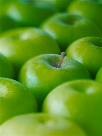 Extreme close up of whole green Granny Smith apples Photographie de stock - Premium Libres de Droits, Code: 6113-07565173