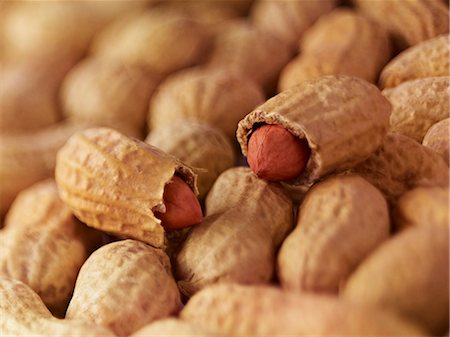 Extreme close up of peanuts in shell Stock Photo - Premium Royalty-Free, Code: 6113-07565174
