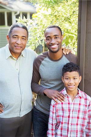 portrait of a grandfather and grandson - Portrait of smiling multi-generation men outdoors Stock Photo - Premium Royalty-Free, Code: 6113-07565453