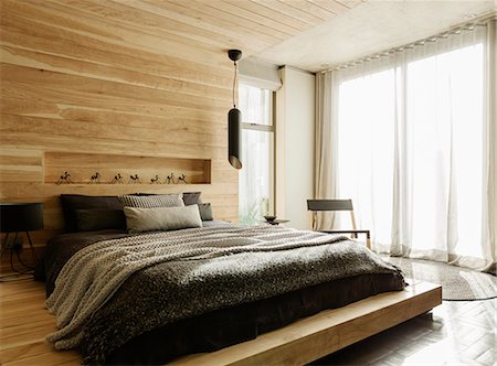 Sunny modern bedroom Foto de stock - Sin royalties Premium, Código: 6113-07565665