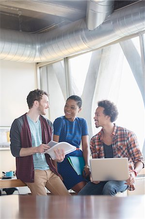 Creative business people talking in meeting Stock Photo - Premium Royalty-Free, Code: 6113-07565891