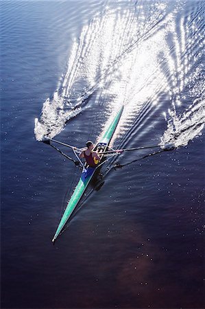 sculling - Man rowing scull on lake Stock Photo - Premium Royalty-Free, Code: 6113-07588746