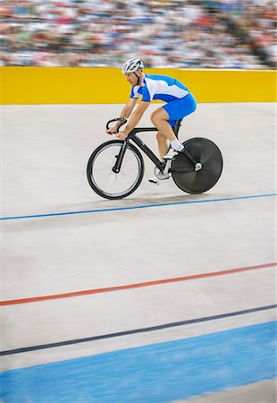 simsearch:6113-07588693,k - Track cyclist riding in velodrome Stock Photo - Premium Royalty-Free, Code: 6113-07588767