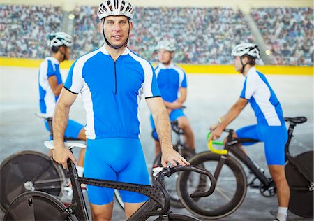 simsearch:6113-07588662,k - Track cyclists standing in velodrome Stock Photo - Premium Royalty-Free, Code: 6113-07588775